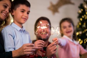 Young family celebrating new year's eve