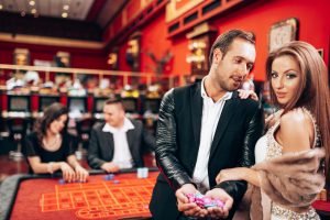 elegant couple at the casino