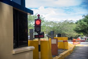 Toll price on a control board in a Colombian highway toll booth.